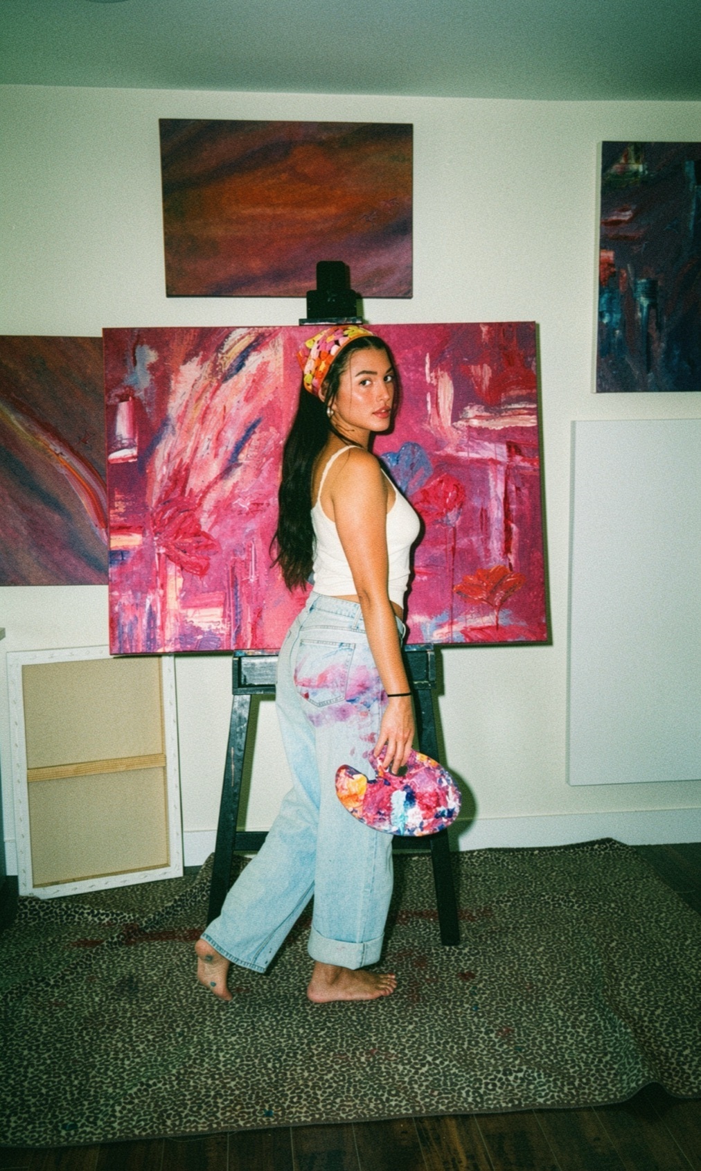 Huntress in her studio, palette in hand
